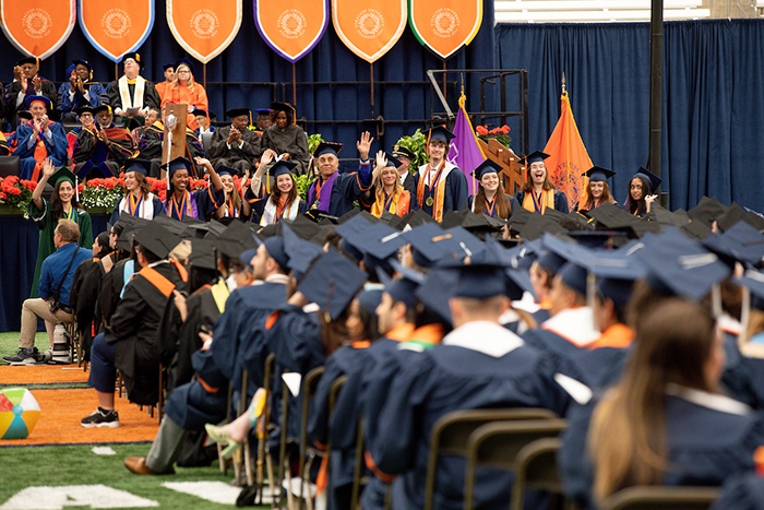 2023 Syracuse University Scholars stand to be recognized
